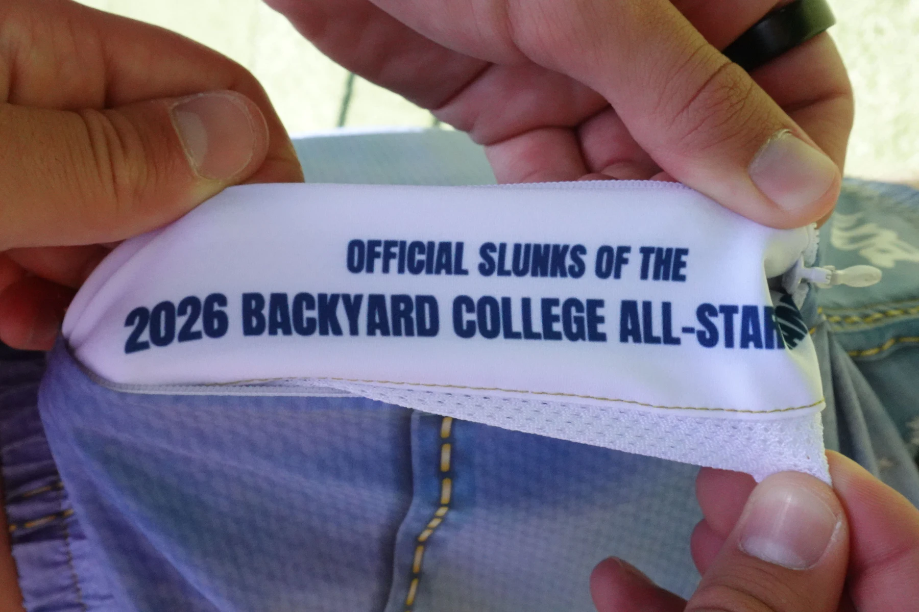 Inside pocket lining printed Official Slunks of the 2026 Backyard College All-Star Game